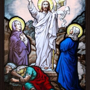 a stained glass window depicting jesus and other people